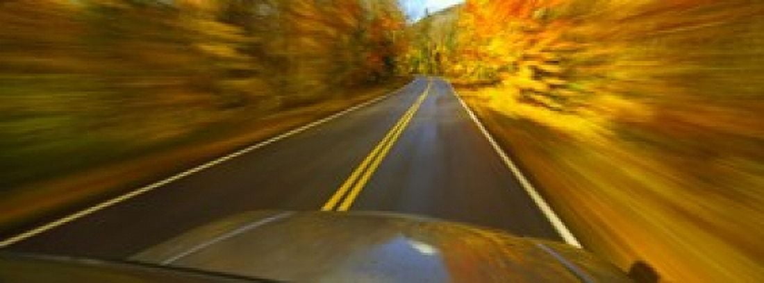 Road viewed through the windshield of a moving car Canvas Art - Panoramic Images (18 x 7)