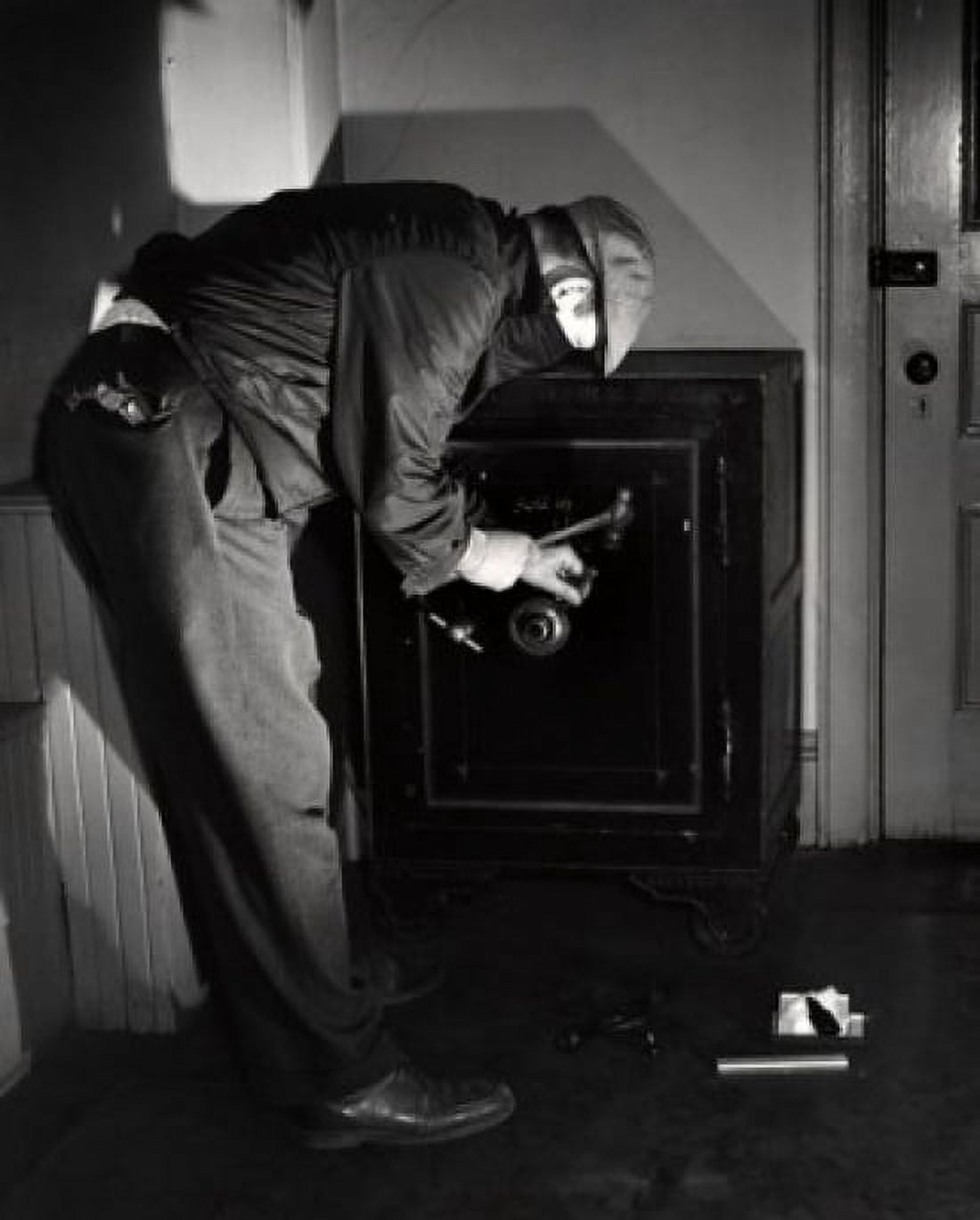 Robber opening safe Canvas Art - (24 x 36)
