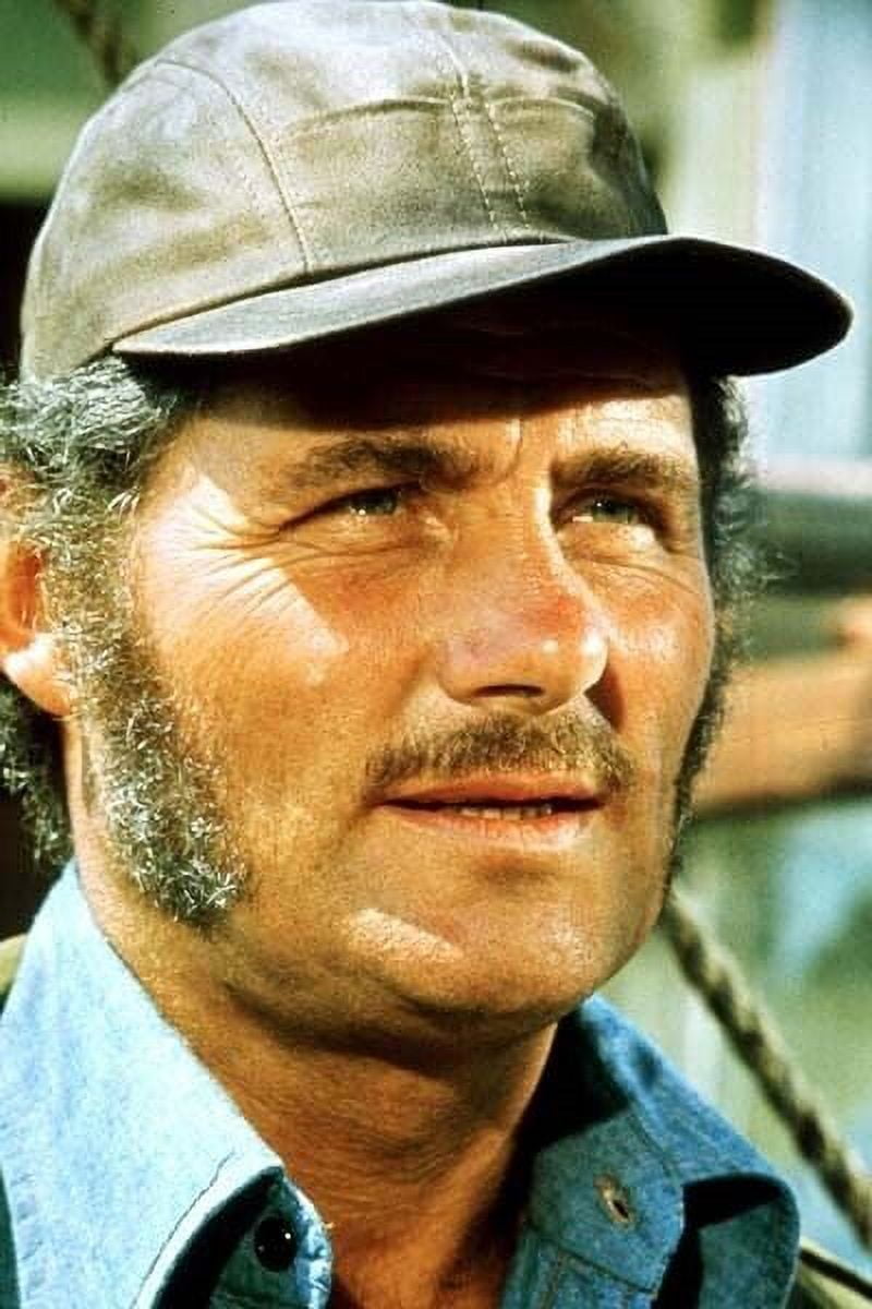 Robert Shaw onboard Orca wearing cap as Quint from Jaws 24x36 poster