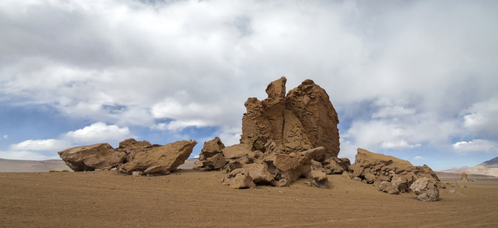 Rock formations in the Pacana Guardians in Los Flamencos National Reserve near San Pedro de Atacama Antofagasta Region Chile Canvas Art - Panoramic Images (27 x 9)