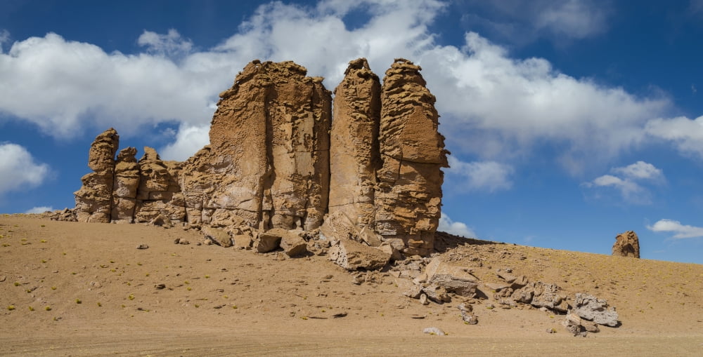 Rock formations in the Pacana Guardians in Los Flamencos National Reserve near San Pedro de Atacama Antofagasta Region Chile Canvas Art - Panoramic Images (27 x 9)
