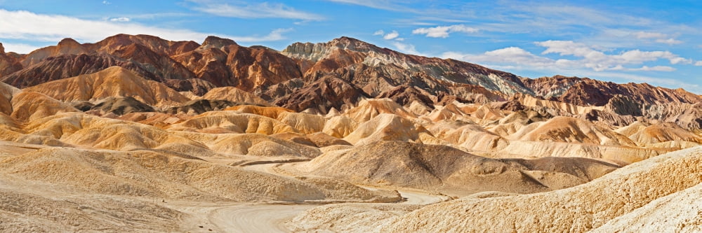 Rock formations Twenty Mule-Team Canyon Death Valley Death Valley National Park California USA Canvas Art - Panoramic Images (27 x 9)