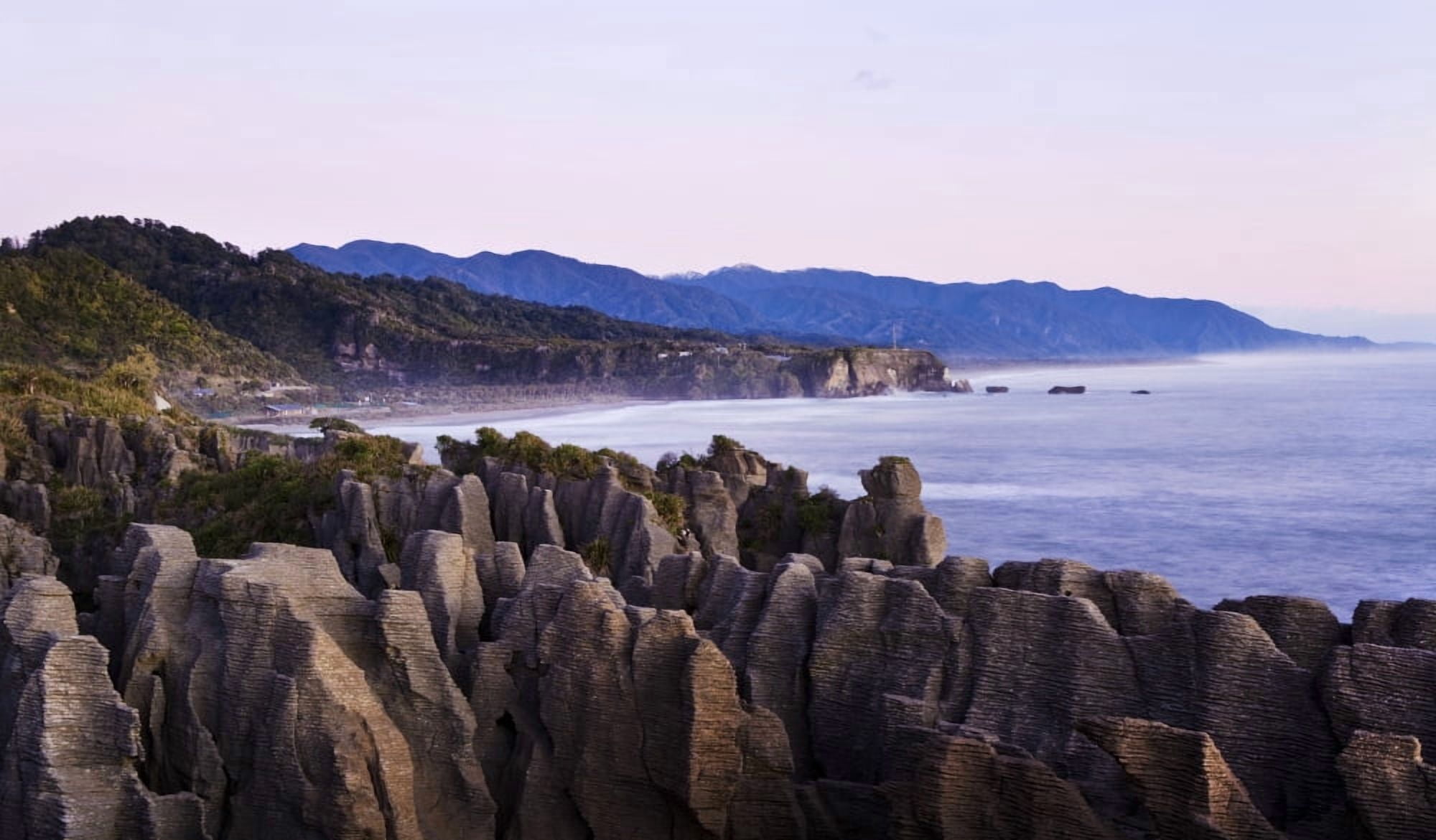 Rock formations at sunset Punakaiki South Island New Zealand Canvas Art - Nicola M Mora Design Pics (20 x 11)