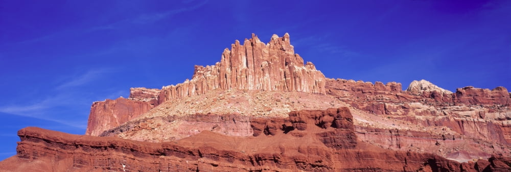 Rock formations in Capitol Reef National Park against blue sky Utah USA Canvas Art - Panoramic Images (36 x 12)
