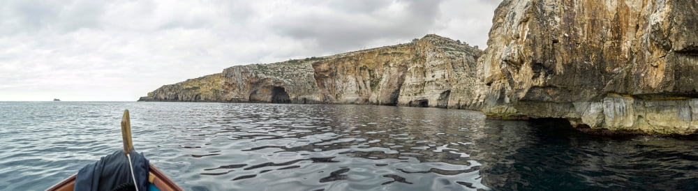 Rock formations in Mediterranean sea Blue Grotto Malta Canvas Art - Panoramic Images (12 x 42)