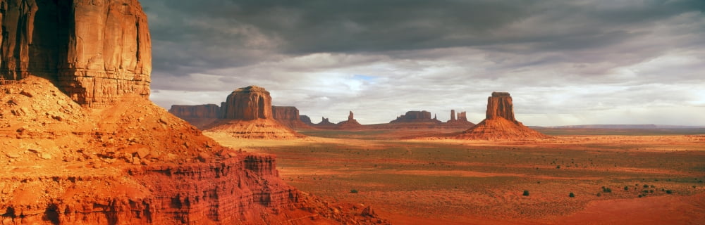 Rock formations in Monument Valley San Juan County Utah USA Canvas Art - Panoramic Images (12 x 36)