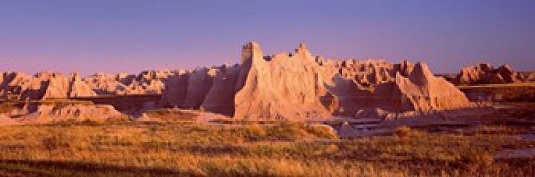 Rock formations in a desert Badlands National Park South Dakota USA Canvas Art - Panoramic Images (18 x 6)