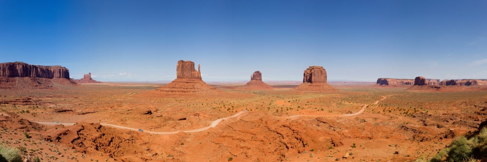 Rock formations in a desert Monument Valley Tribal Park Arizona USA Canvas Art - Panoramic Images (36 x 12)