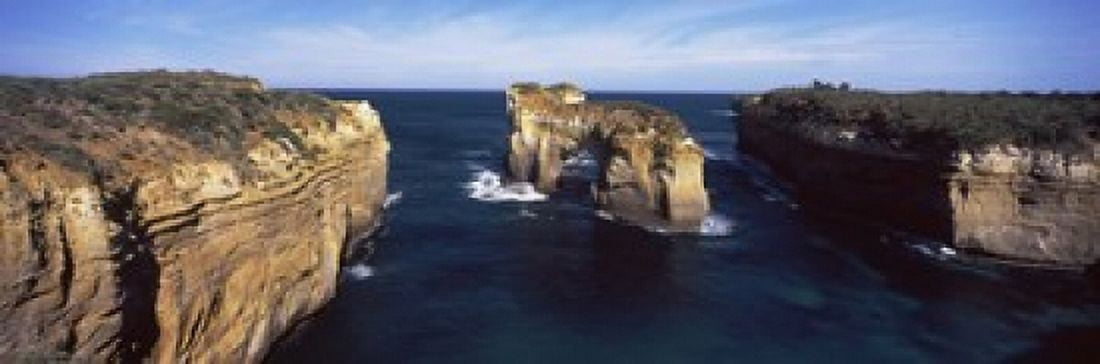 Rock formations in the ocean Campbell National Park Great Ocean Road Victoria Australia Canvas Art - Panoramic Images (18 x 6)