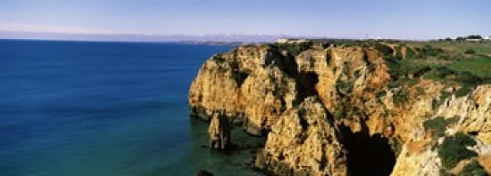 Rock formations in the ocean Lagos Algarve Portugal Canvas Art - Panoramic Images (36 x 13)