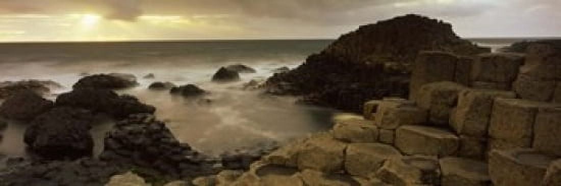 Rock formations in the sea Giants Causeway County Antrim Northern Ireland Canvas Art - Panoramic Images (18 x 6)