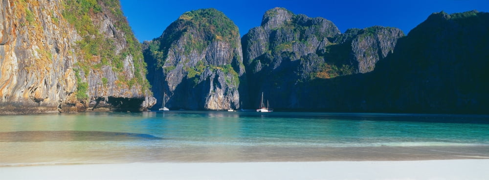 Rock formations in the sea Phi Phi Islands Phuket Province Thailand Canvas Art - Panoramic Images (27 x 9)