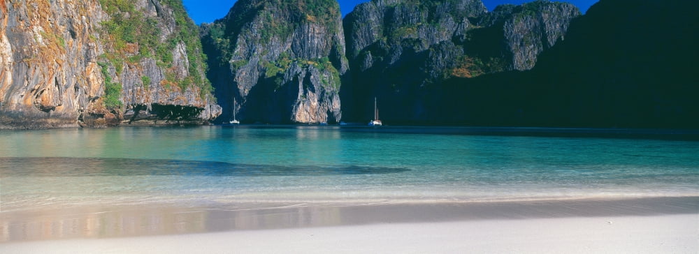 Rock formations in the sea Phi Phi Islands Phuket Province Thailand Canvas Art - Panoramic Images (36 x 12)
