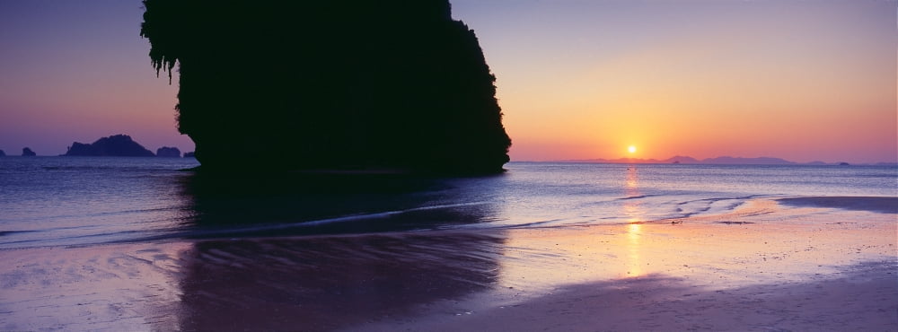 Rock formations in the sea at dusk Railay Beach Krabi Krabi Province Thailand Canvas Art - Panoramic Images (36 x 12)
