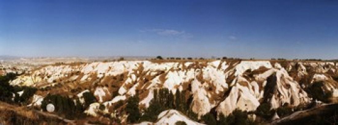 Rock formations on a landscape Cappadocia Central Anatolia Region Turkey Canvas Art - Panoramic Images (15 x 6)