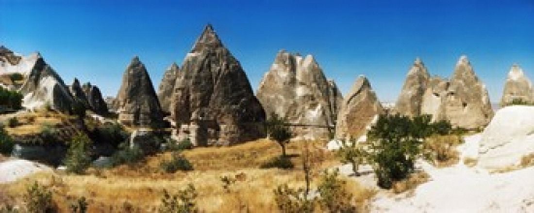 Rock formations on a landscape Cappadocia Central Anatolia Region Turkey Canvas Art - Panoramic Images (15 x 6)