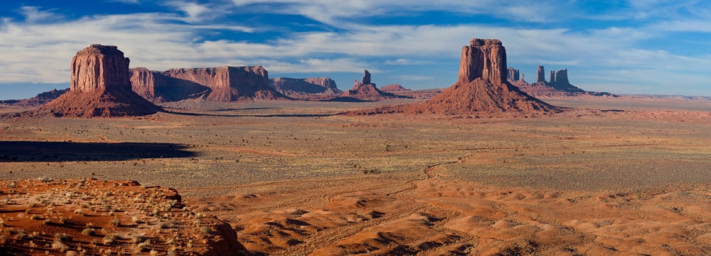 Rock formations on a landscape Monument Valley Utah and Arizona USA Canvas Art - Panoramic Images (36 x 12)