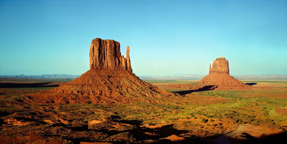 Rock formations on a landscape The Mittens Monument Valley Tribal Park Arizona USA Canvas Art - Panoramic Images (12 x 24)
