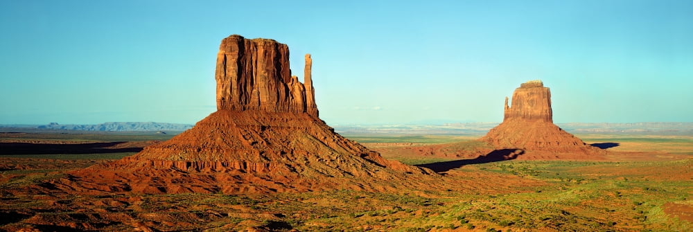 Rock formations on a landscape The Mittens Monument Valley Tribal Park Arizona USA Canvas Art - Panoramic Images (12 x 36)