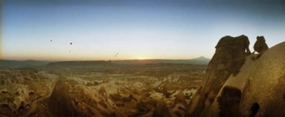 Rock formations on a landscape at sunrise Cappadocia Central Anatolia Region Turkey Canvas Art - Panoramic Images (15 x 6)