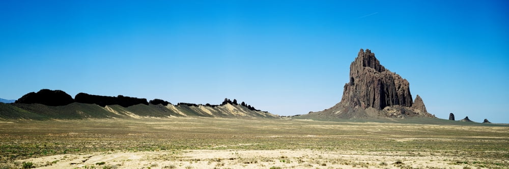 Rock formations on an arid landscape Ship Rock San Juan County New Mexico USA Canvas Art - Panoramic Images (6 x 18)
