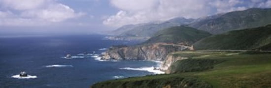 Rock formations on the beach Bixby Bridge Pacific Coast Highway Big Sur California USA Canvas Art - Panoramic Images (36 x 12)