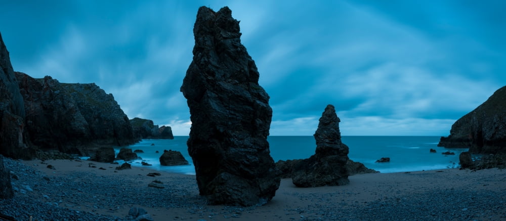 Rock formations on the beach Pembrokeshire Coast National Park Pembrokeshire Wales Canvas Art - Panoramic Images (7 x 15)
