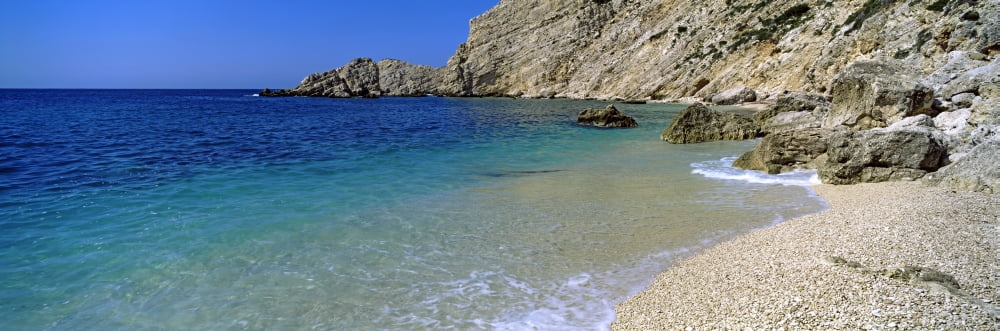 Rock formations on the beach Petani Beach Cephalonia Ionian Islands Greece Canvas Art - Panoramic Images (27 x 9)