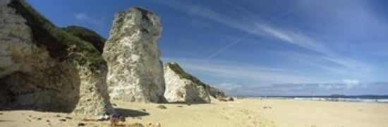 Rock formations on the beach White Rock Bay Portrush County Antrim Northern Ireland Canvas Art - Panoramic Images (36 x 12)
