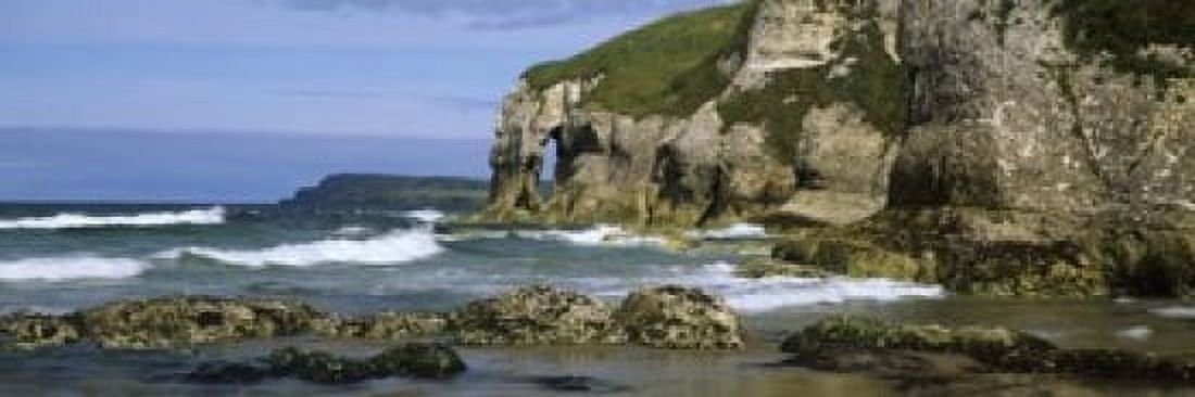 Rock formations on the beach Whiterocks Beach Portrush County Antrim Northern Ireland Canvas Art - Panoramic Images (18 x 6)