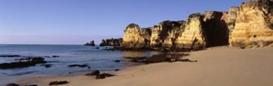 Rock formations on the coast Algarve Lagos Portugal Canvas Art - Panoramic Images (36 x 12)