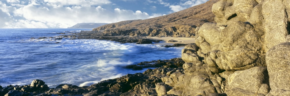 Rock formations on the coast Cerritos Beach Cabo San Lucas Todos Santos Baja California Mexico Canvas Art - Panoramic Images (27 x 9)
