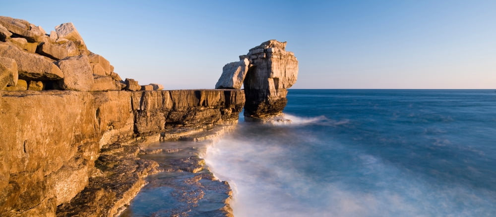 Rock formations on the coast Dorset England Canvas Art - Panoramic Images (27 x 9)