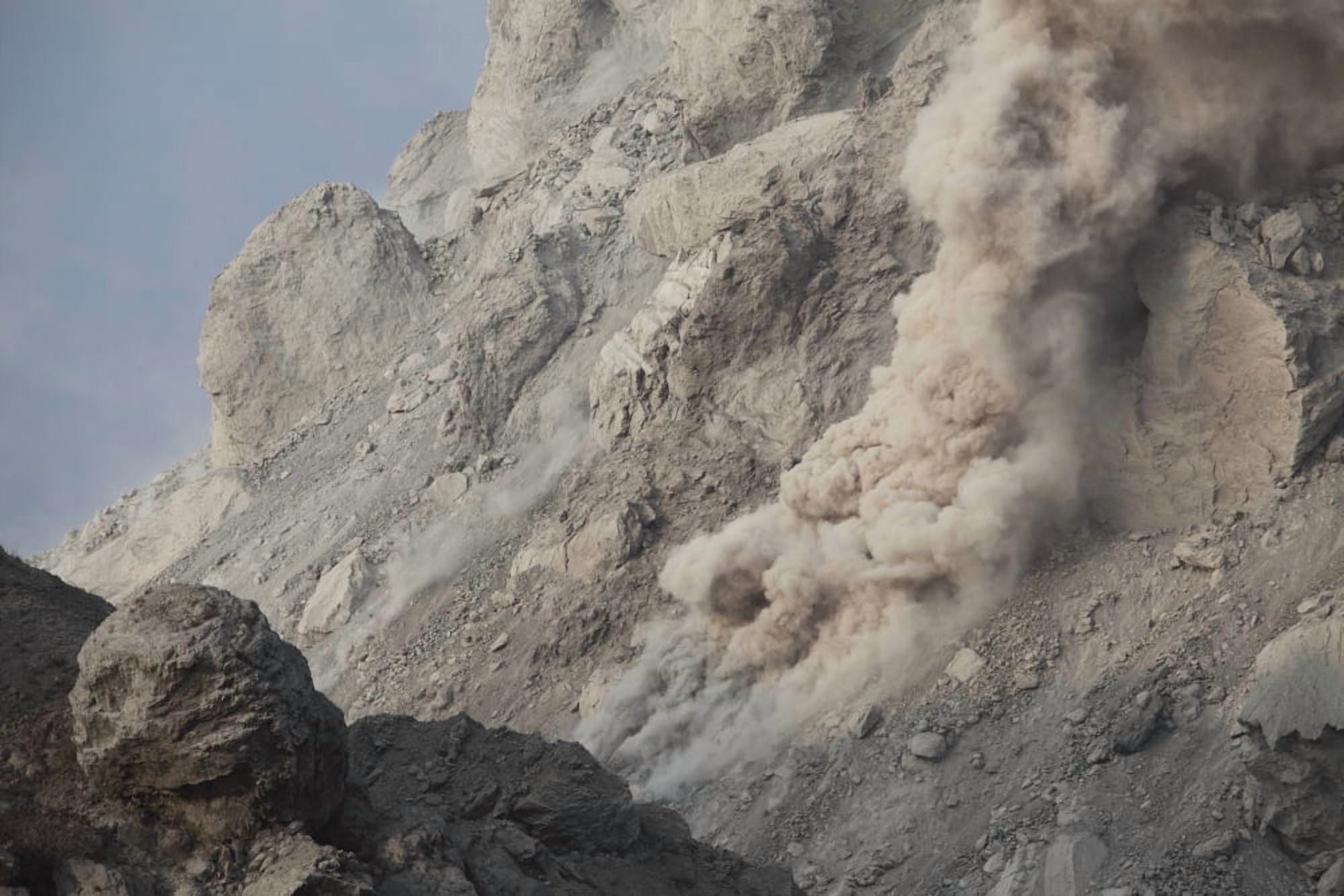 Rockfall on flank of Rerombola lava dome of Paluweh volcano Indonesia Canvas Art - Richard RoscoeStocktrek Images (18 x 12)