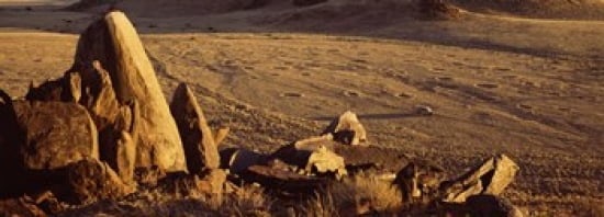Rocks in a desert overview of tourist vehicle Namibia Canvas Art - Panoramic Images (36 x 13)