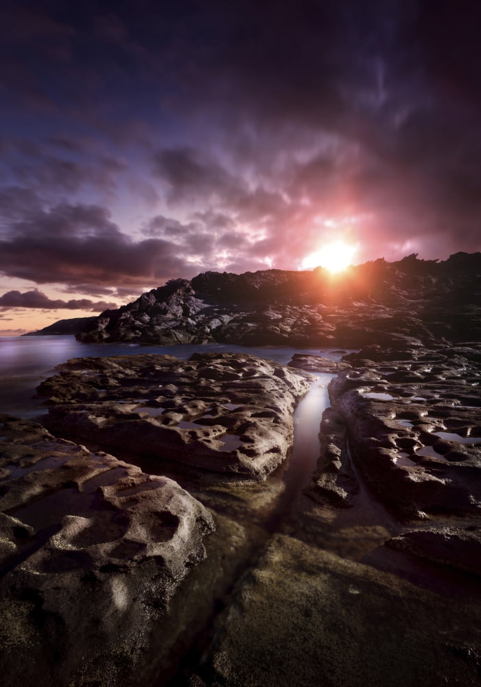 Rocky shore and tranquil sea against cloudy sky at sunset Sardinia Italy Canvas Art - Evgeny KuklevStocktrek Images (12 x 17)