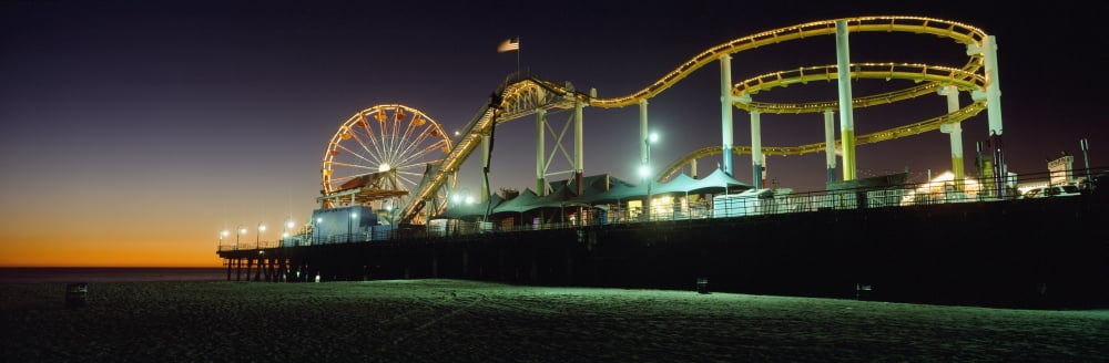 Rollercoaster And Ferris Wheel At Dusk On The Santa Monica Pier Canvas Art - Ian Cumming Design Pics (44 x 15)