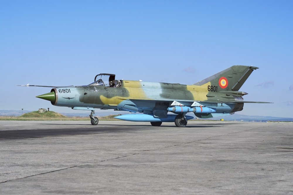 Romanian Air Force MiG-21 Lancer on the ramp at Camp Turzii Canvas Art - Daniele FaccioliStocktrek Images (17 x 12)