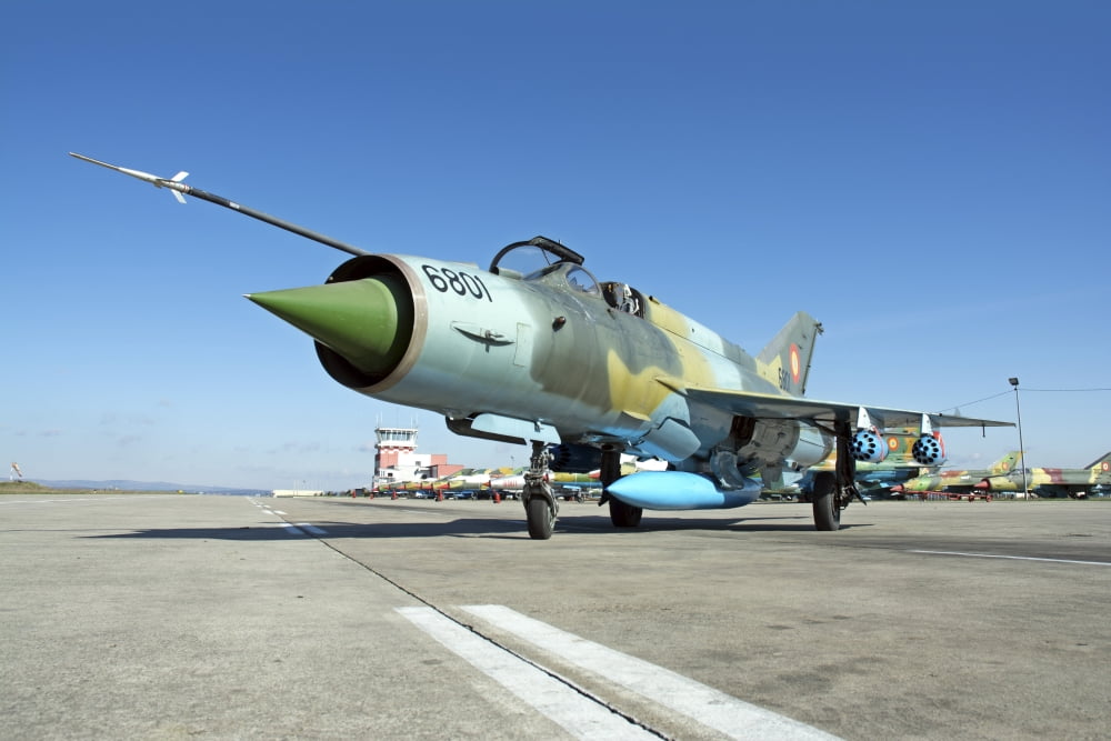 Romanian Air Force MiG-21 Lancer on the ramp at Camp Turzii Canvas Art - Daniele FaccioliStocktrek Images (34 x 23)
