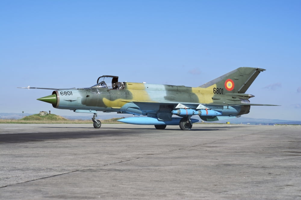 Romanian Air Force MiG-21 Lancer on the ramp at Camp Turzii Canvas Art - Daniele FaccioliStocktrek Images (34 x 23)