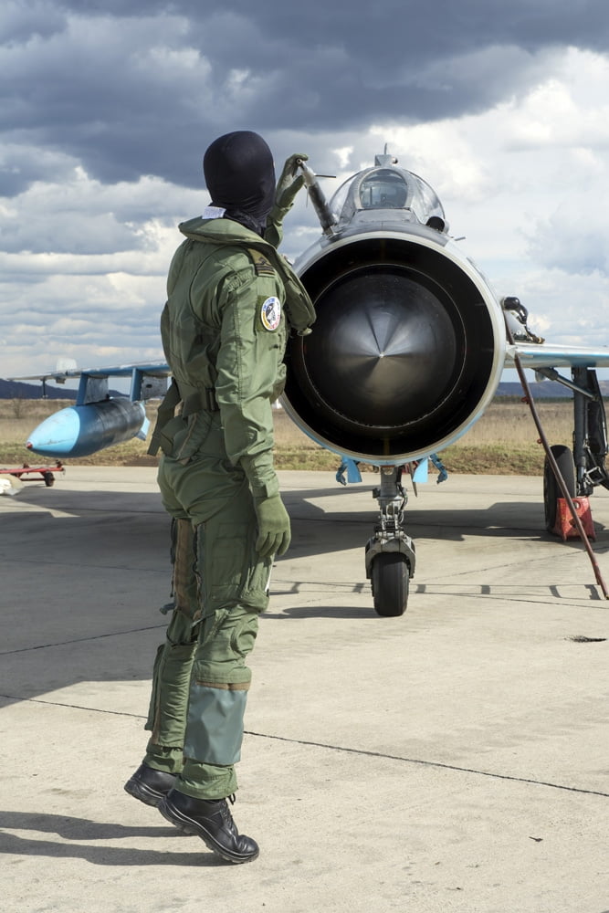 Romanian Air Force pilot checking his MiG-21 Lancer Canvas Art - Daniele FaccioliStocktrek Images (12 x 17)