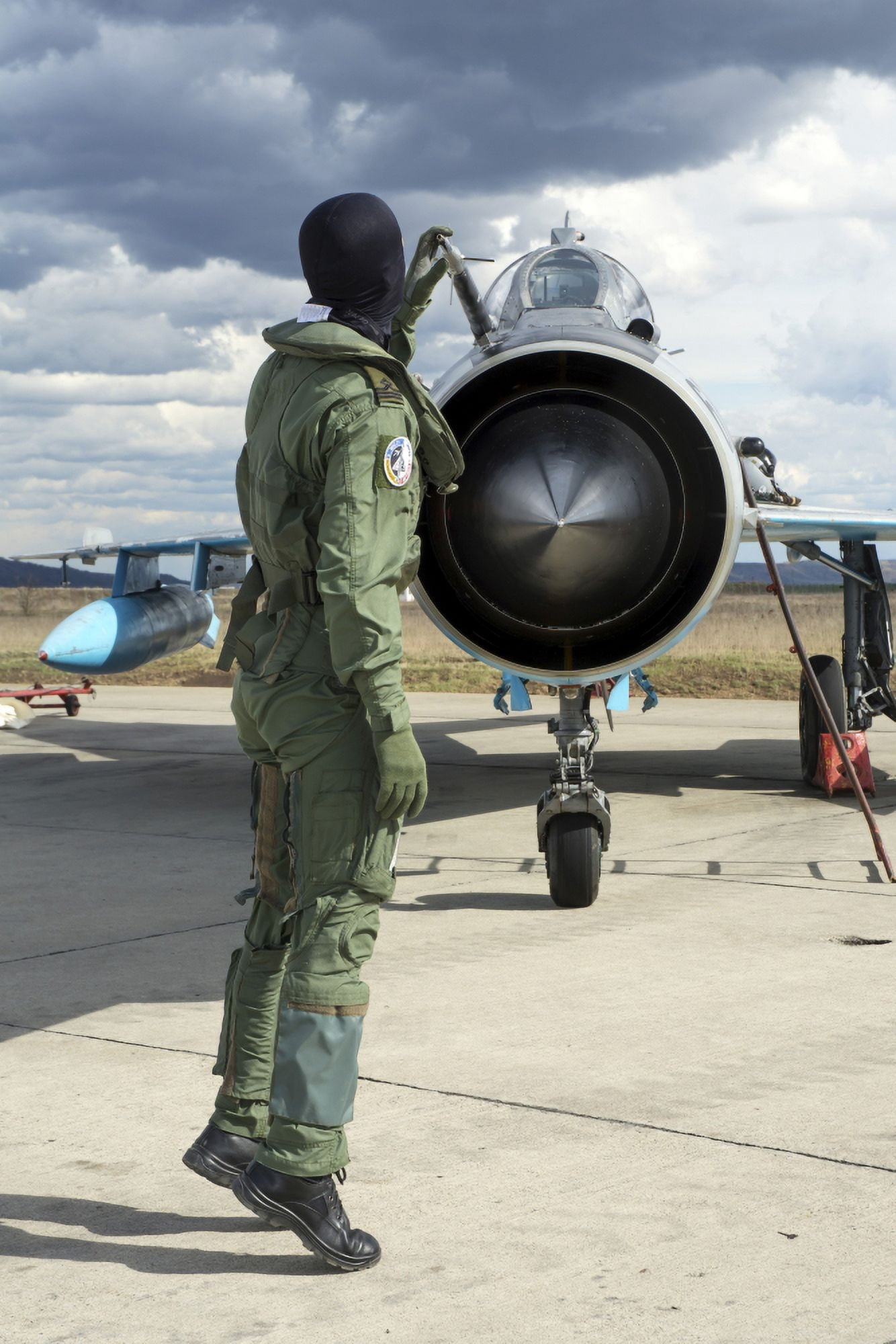 Romanian Air Force pilot checking his MiG-21 Lancer Canvas Art - Daniele FaccioliStocktrek Images (23 x 34)