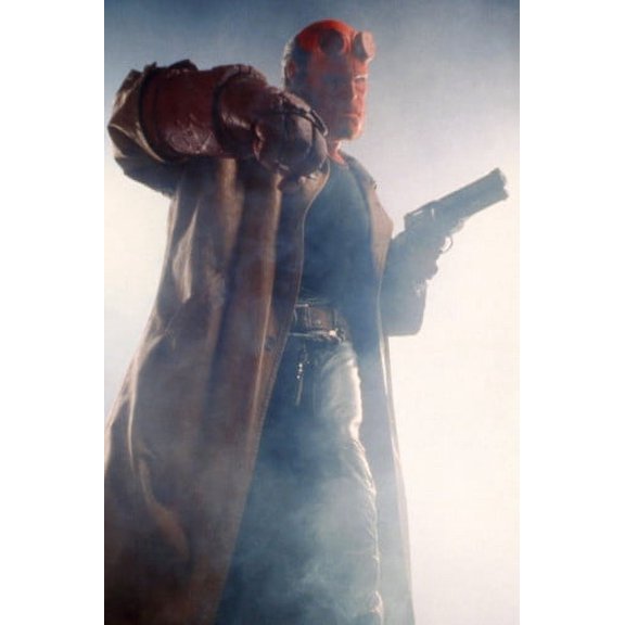 Ron Perlman in Hellboy pose with glove holding gun 24x36 Poster