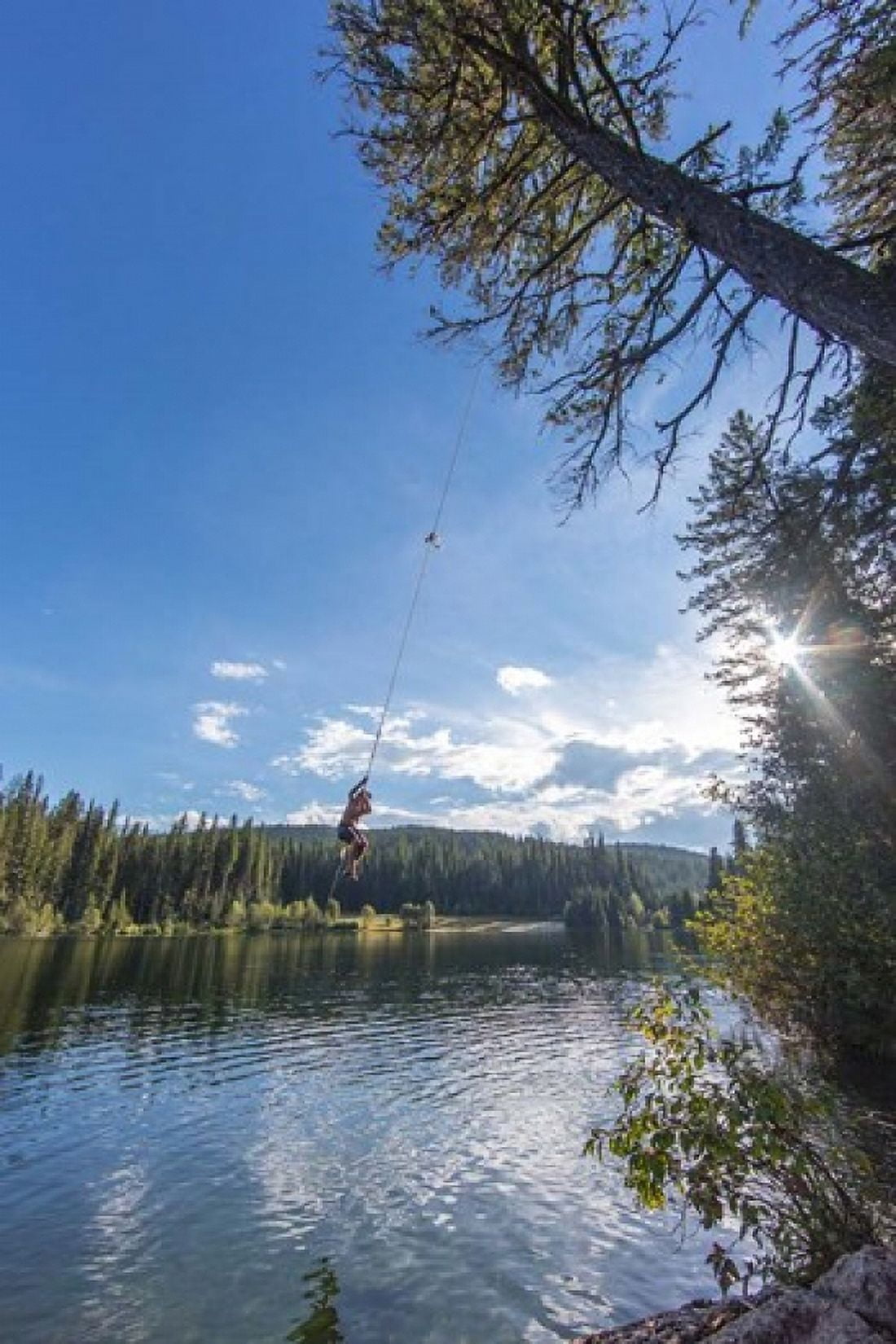 Rope swinging at Champion Lakes Provincial Park BC Canada Canvas Art - Chuck Haney DanitaDelimont (20 x 29)