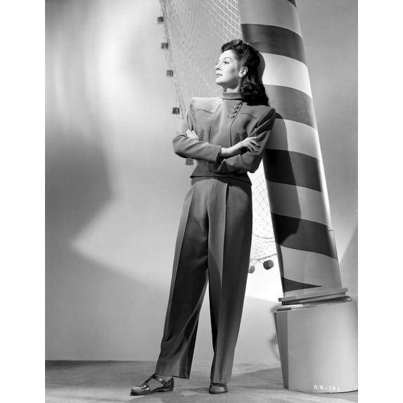 Rosalind Russell Posed and Leaning on Post Photo Print (8 x 10)