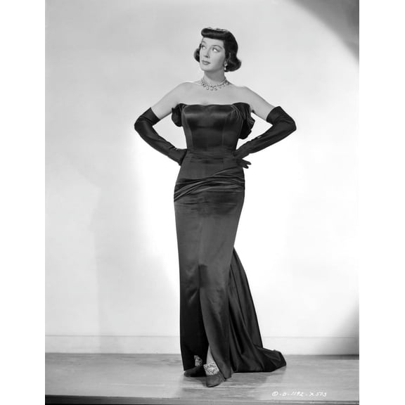 Rosalind Russell Posed in Black Dress with Hands on Hips Photo Print (8 x 10)