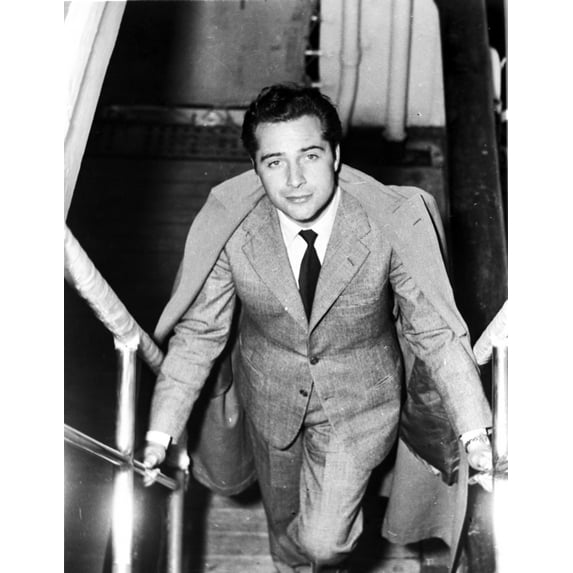 Rossano Brazzi on a staircase Photo Print (24 x 30)