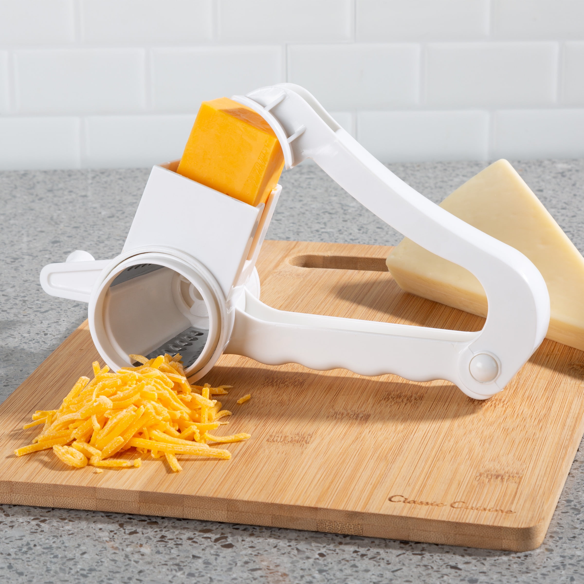 https://i5.walmartimages.com/seo/Rotary-Grater-Handheld-Manual-Crank-Shredder-Kitchen-Cooking-Accessory-with-3-Drums-for-Cheese-Chocolate-Nuts-and-Vegetables-by-Classic-Cuisine_df25c46b-fef5-45ee-b976-2e37a0983dd9_1.2c4fea5f8fa88535802a44a530010081.jpeg