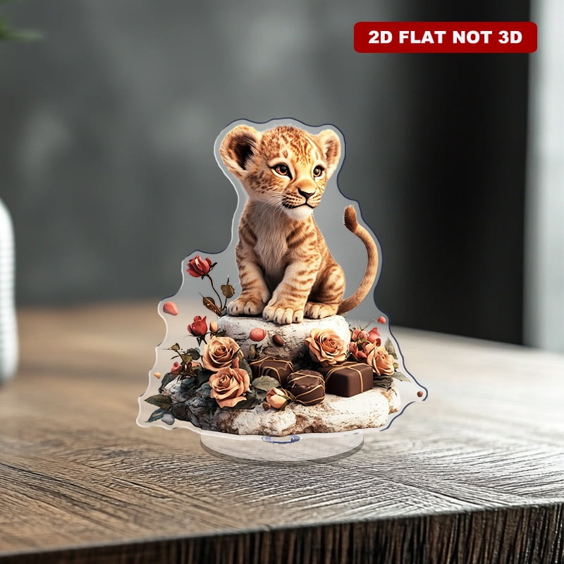 Rotating acrylic display featuring a lion cub on stone with roses and ...