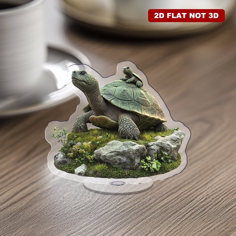 Rotating acrylic ornament featuring a turtle with a small turtle on its ...